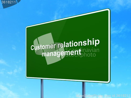 Image of Marketing concept: Customer Relationship Management on road sign background