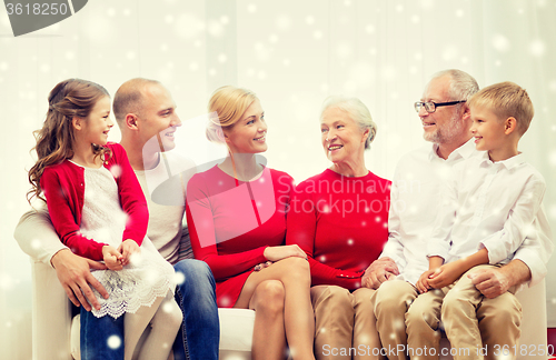 Image of smiling family at home