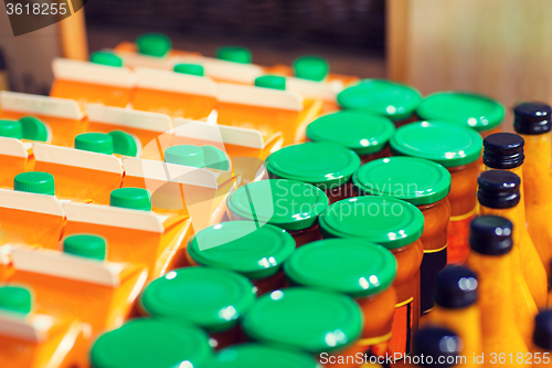 Image of jars and bottles with eco food at bio market