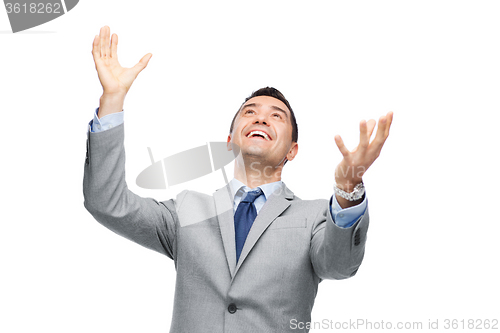 Image of happy laughing businessman in suit