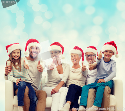 Image of happy family sitting on couch