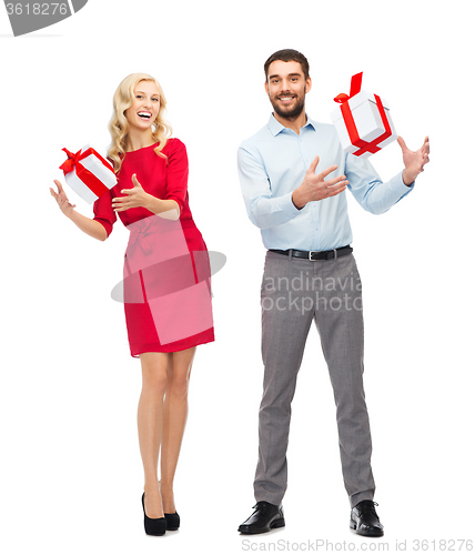 Image of happy couple with gift boxes