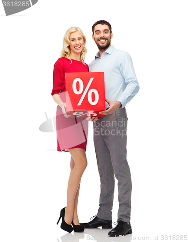 Image of happy couple with red sale sign