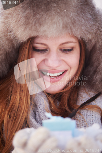 Image of winter girl with gift