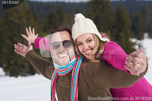 Image of romantic young couple on winter vacation