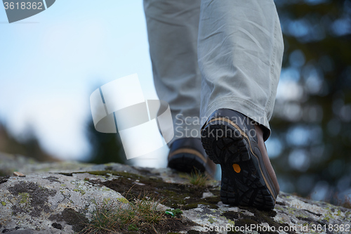 Image of hiking man with trekking boots