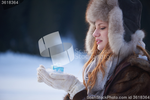 Image of winter girl with gift