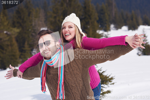 Image of romantic young couple on winter vacation