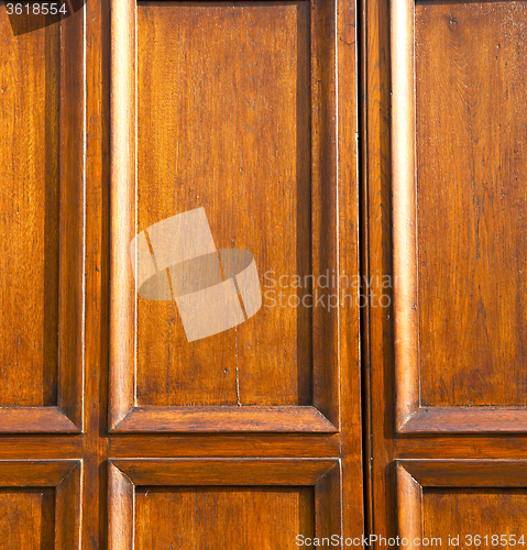 Image of  in mozzate rusty  door curch  closed metal wood italy  milan
