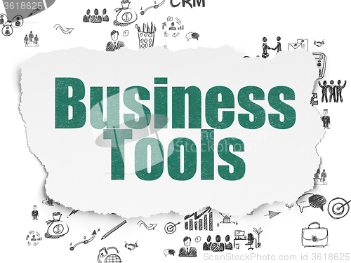 Image of Finance concept: Business Tools on Torn Paper background