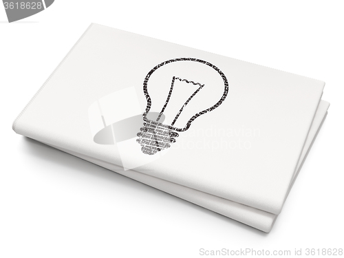 Image of Business concept: Light Bulb on Blank Newspaper background