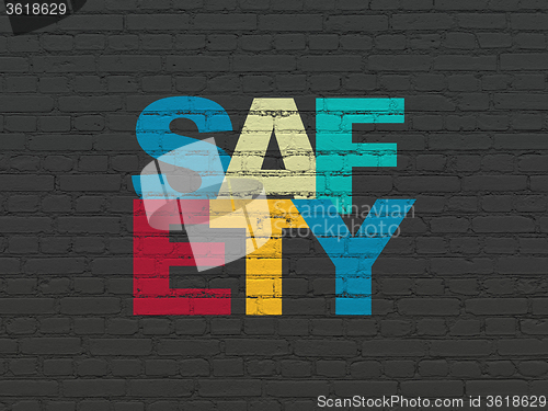 Image of Protection concept: Safety on wall background