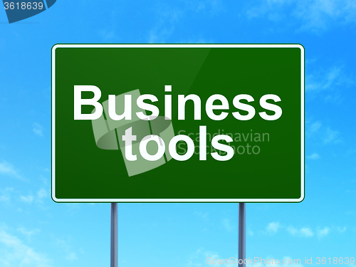 Image of Finance concept: Business Tools on road sign background