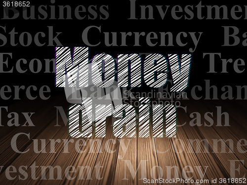 Image of Money concept: Money Drain in grunge dark room