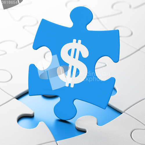 Image of Money concept: Dollar on puzzle background