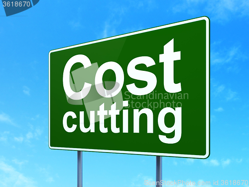 Image of Business concept: Cost Cutting on road sign background
