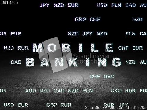 Image of Currency concept: Mobile Banking in grunge dark room