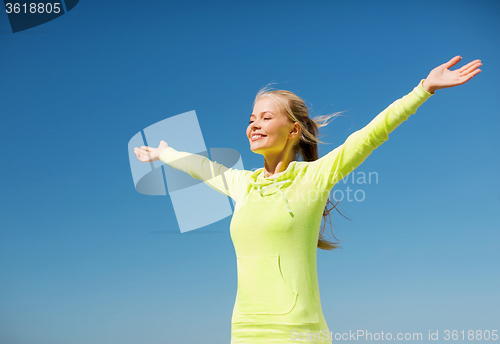 Image of woman doing sports outdoors