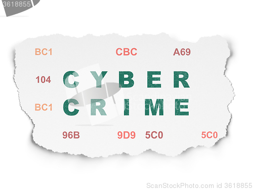 Image of Privacy concept: Cyber Crime on Torn Paper background