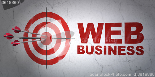 Image of Web design concept: target and Web Business on wall background