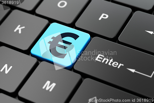 Image of Money concept: Euro on computer keyboard background
