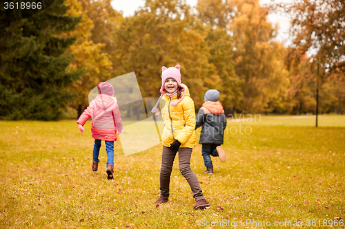 Image of group of happy little kids running outdoors