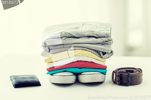 Image of close up of clothes and accessories on table