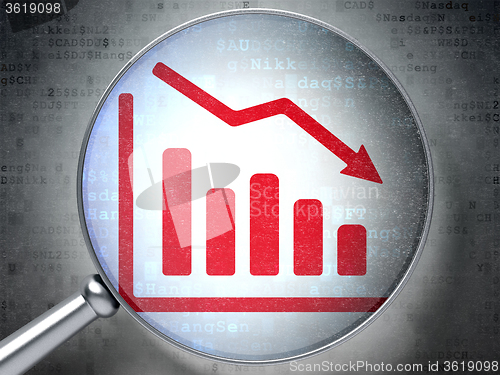 Image of Business concept: Decline Graph with optical glass on digital background