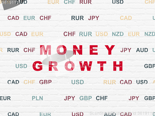 Image of Currency concept: Money Growth on wall background