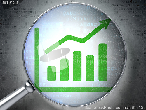 Image of Finance concept: Growth Graph with optical glass on digital background