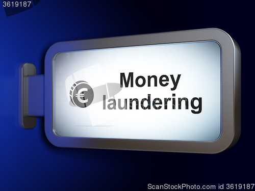 Image of Money concept: Money Laundering and Euro Coin on billboard background