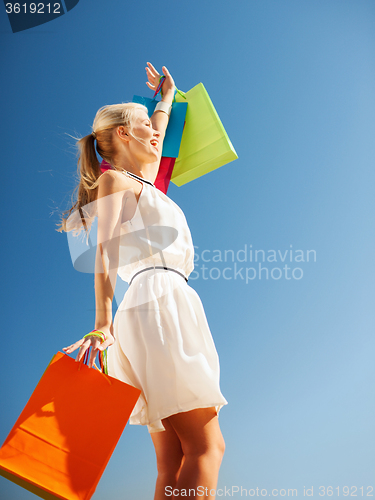 Image of woman with shopping bags
