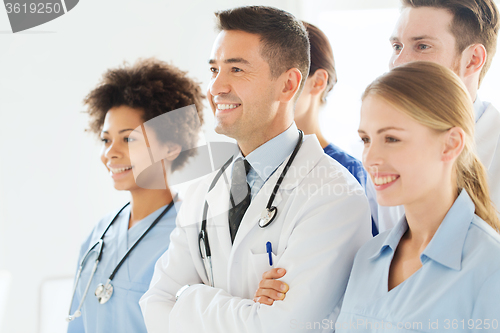 Image of group of happy doctors at hospital