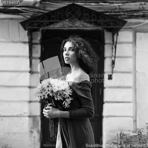 Image of Fashion style colorless  photo of a young woman