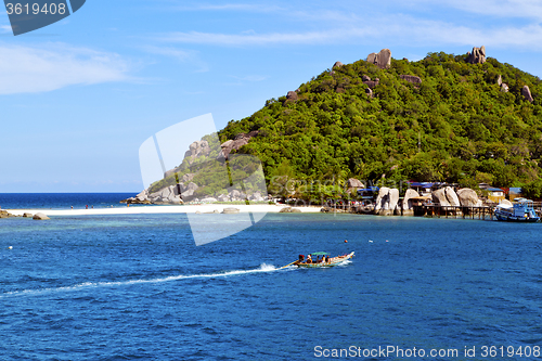 Image of  rocks house boat in thailand  and south china sea 