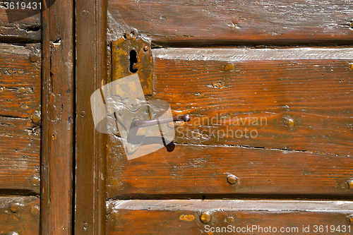 Image of samarate  abstract   rusty brass   wood lombardy varese 