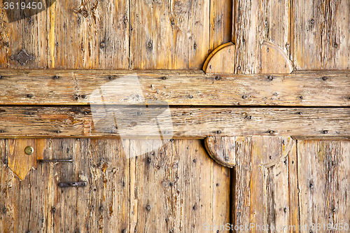 Image of  abstract   rusty brass brown  closed wood  italy   