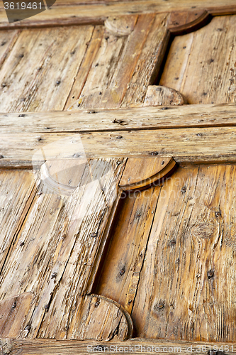 Image of cavaria abstract   knocker in a  door  wood lombardy italy   