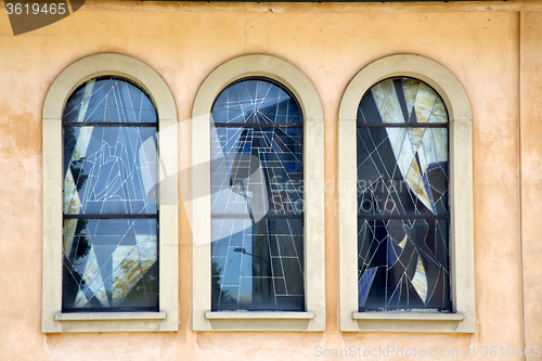Image of jerago cross church   window   and mosaic wall  
