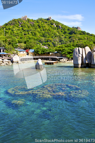 Image of   kho white  beach    rocks  boat in thailand   