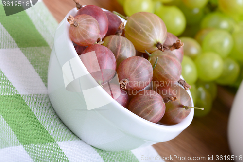 Image of gooseberry and grapes health food concept