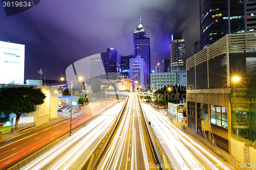 Image of Car light trails and urban landscape in Hong Kong