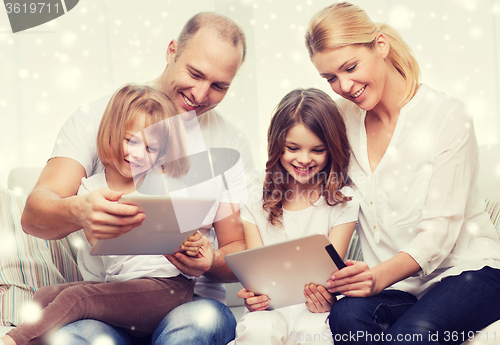 Image of happy family with tablet pc computers