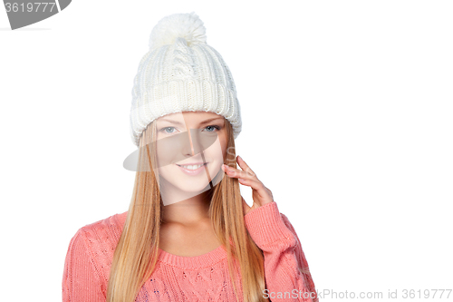 Image of Woman wearing woolen hat and sweater