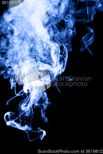 Image of Blue smoke on black background
