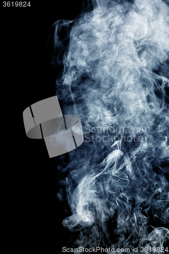 Image of Fluffy Puffs of Smoke and Fog on Black Background