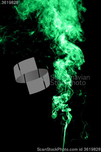 Image of Green smoke on black background