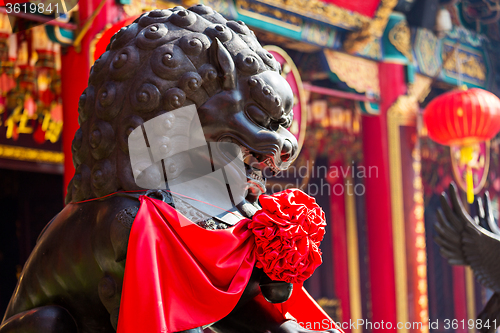 Image of Lion statue in Chinese temple