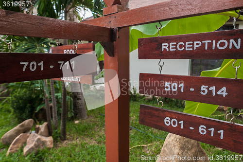 Image of signboard on the beach at hotel, Koh Samui, Thailand