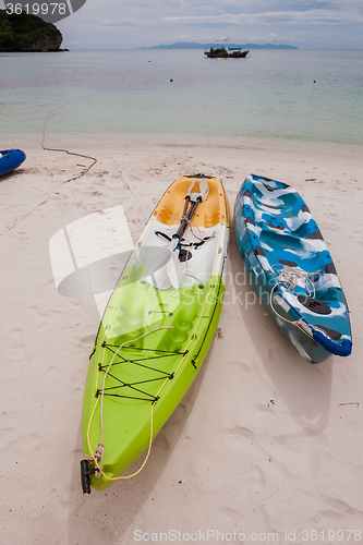 Image of Colorful kayaks on beach in Thailand